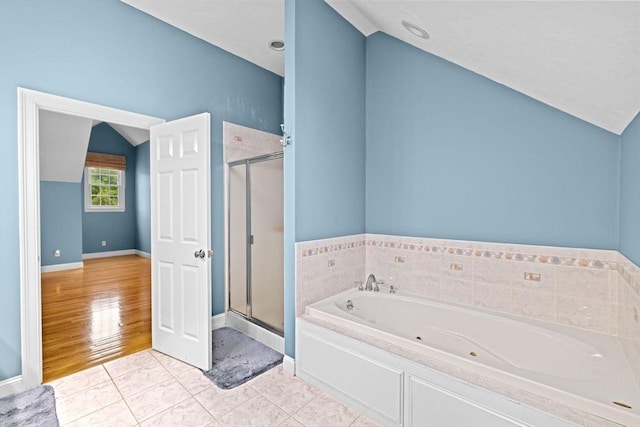 15 Henrys Ln, Norwell, MA 02061 - full bath featuring lofted ceiling, a stall shower, a whirlpool tub, tile patterned floors, and baseboards
