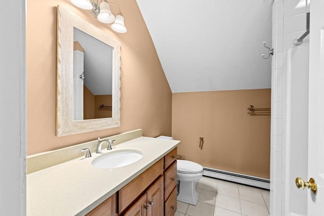15 Henrys Ln, Norwell, MA 02061 - bathroom with a baseboard heating unit, vaulted ceiling, toilet, vanity, and tile patterned flooring
