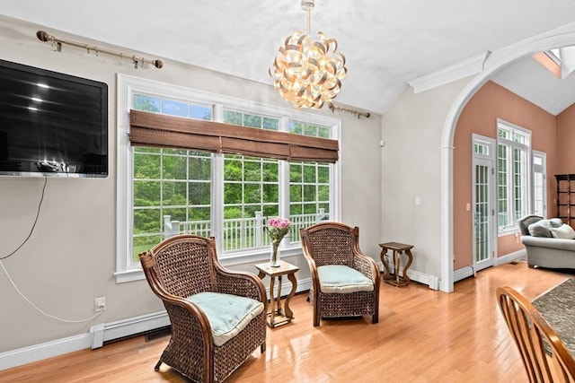 15 Henrys Ln, Norwell, MA 02061 - sitting room with arched walkways, a baseboard radiator, light wood-type flooring, a chandelier, and lofted ceiling