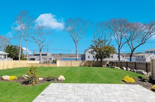 25 W Ave, Marion, MA 02738 - view of yard with a fenced backyard, a patio, and a residential view
