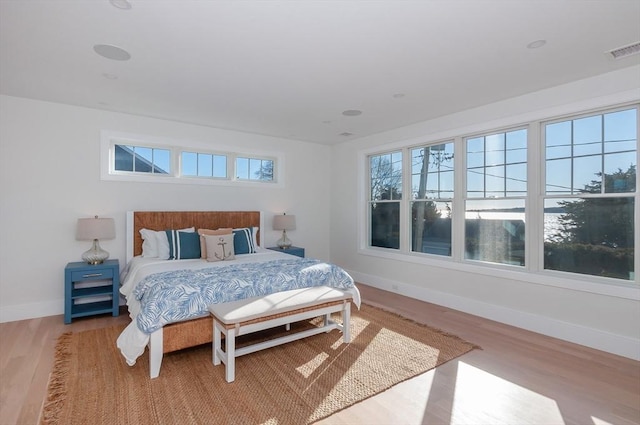 25 W Ave, Marion, MA 02738 - bedroom featuring visible vents, baseboards, and wood finished floors