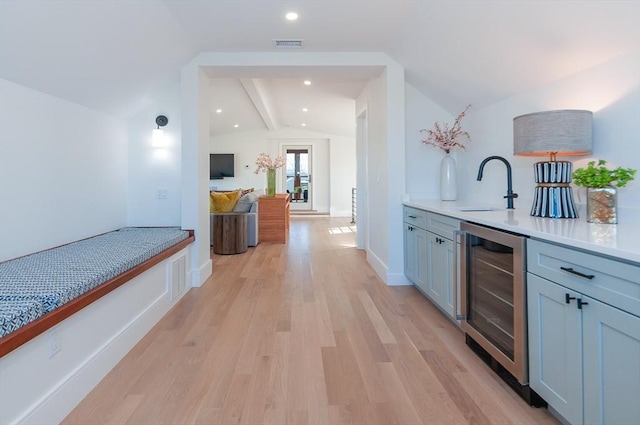 25 W Ave, Marion, MA 02738 - bar featuring wet bar, visible vents, a sink, lofted ceiling with beams, and wine cooler