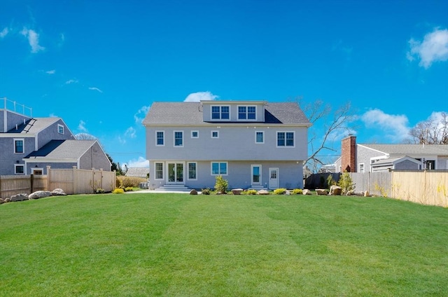 25 W Ave, Marion, MA 02738 - rear view of house with a fenced backyard and a yard
