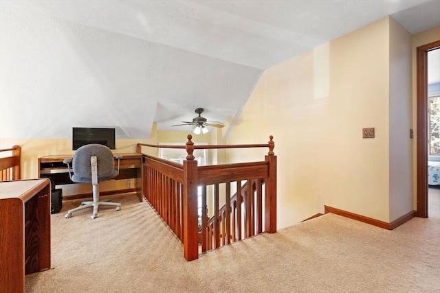 bedroom with lofted ceiling, light colored carpet, and ceiling fan