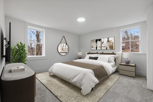 bedroom with light colored carpet