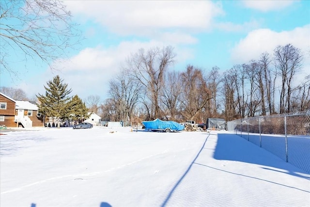 view of yard covered in snow