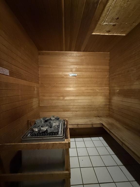 30 Revere Beach Pkwy Unit 116, Medford, MA 02155 - sauna with wood ceiling, wooden walls, and tile patterned floors