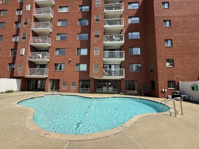 30 Revere Beach Pkwy Unit 116, Medford, MA 02155 - community pool with a patio area