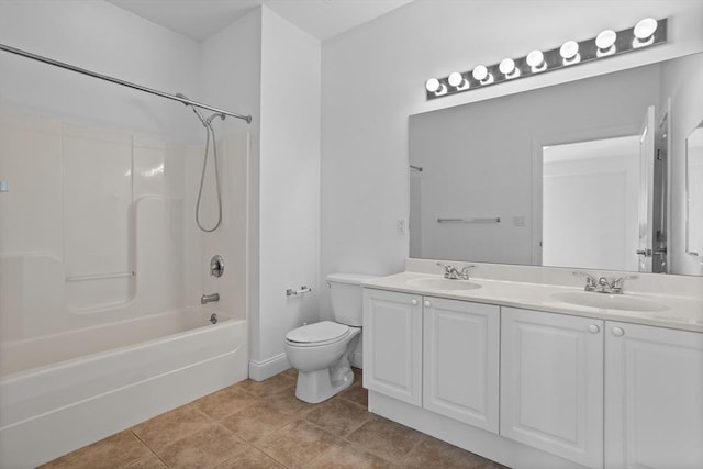 full bathroom featuring vanity, toilet, bathing tub / shower combination, and tile patterned flooring