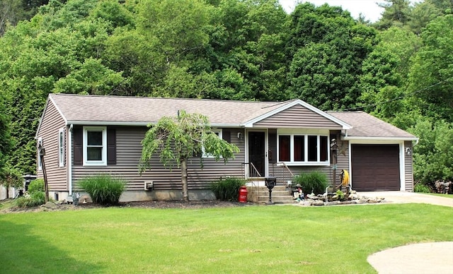 155 Old Palmer Rd, Brimfield, MA 01010 - ranch-style house featuring a garage, a front lawn, concrete driveway, a shingled roof, and a forest view