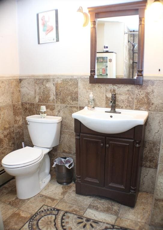 155 Old Palmer Rd, Brimfield, MA 01010 - bathroom with vanity, tile walls, and wainscoting