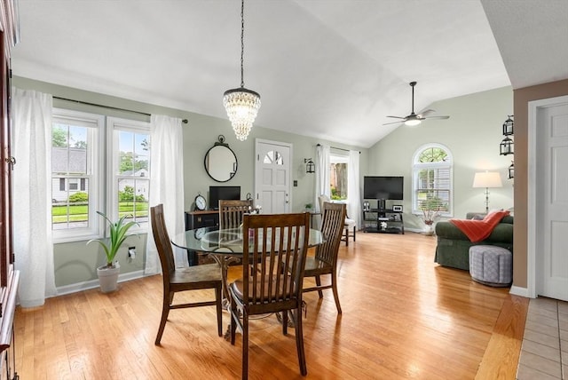 97 Connecticut Ave, Springfield, MA 01104 - dining area featuring ceiling fan, light wood-style flooring, lofted ceiling, and a chandelier