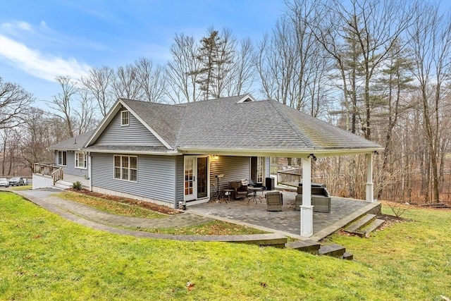 285 Still River Rd, Bolton, MA 01740 - back of property with a yard, a patio area, an outdoor hangout area, and a shingled roof