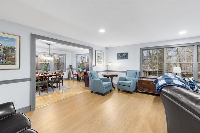 285 Still River Rd, Bolton, MA 01740 - living area with light wood-style floors, recessed lighting, and a notable chandelier