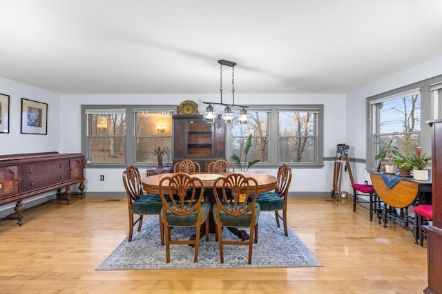 285 Still River Rd, Bolton, MA 01740 - dining area featuring light wood-style flooring and baseboards