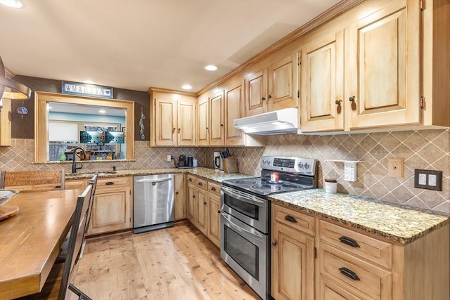 285 Still River Rd, Bolton, MA 01740 - kitchen with light brown cabinets, under cabinet range hood, appliances with stainless steel finishes, a sink, and light wood-type flooring