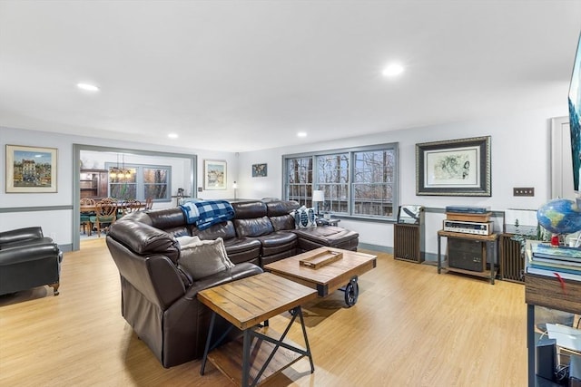 285 Still River Rd, Bolton, MA 01740 - living room with recessed lighting, a notable chandelier, light wood finished floors, and plenty of natural light