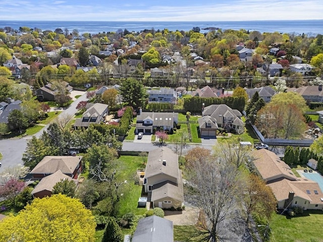bird's eye view with a water view and a residential view