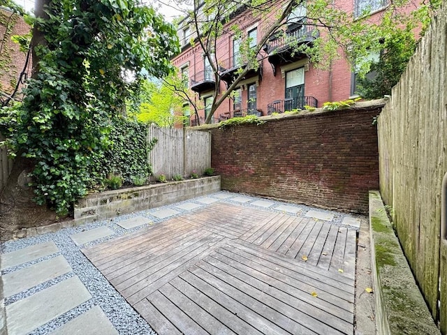 191 W Canton Unit 1, Boston, MA 02116 - wooden terrace with a fenced backyard