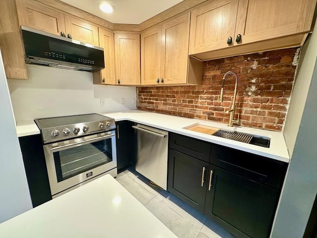 191 W Canton Unit 1, Boston, MA 02116 - kitchen featuring stainless steel appliances, a sink, ventilation hood, and light countertops
