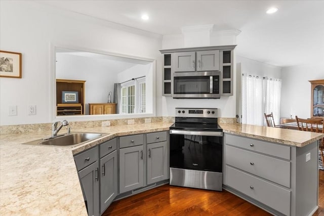 23 Brookstone Unit 23, Bridgewater, MA 02324 - kitchen with stainless steel appliances, gray cabinetry, a peninsula, a sink, and recessed lighting