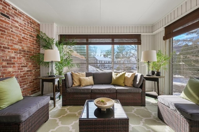 sunroom / solarium featuring a wealth of natural light