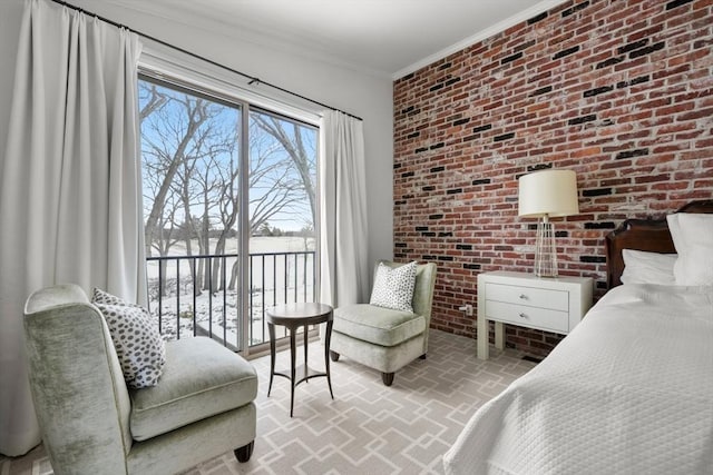 bedroom with brick wall, access to outside, brick floor, and crown molding