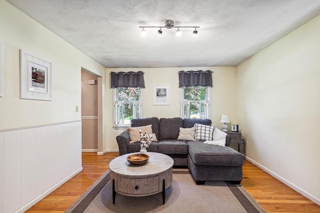 2 Strawstone Ln, Norton, MA 02766 - living room featuring wood finished floors and baseboards