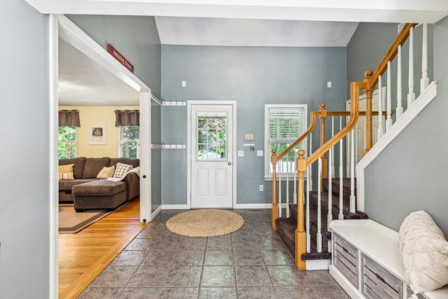 2 Strawstone Ln, Norton, MA 02766 - entryway featuring stairway, plenty of natural light, and baseboards