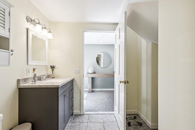 2 Strawstone Ln, Norton, MA 02766 - bathroom with tile patterned flooring, vanity, toilet, and baseboards