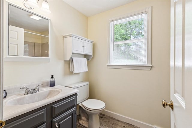 2 Strawstone Ln, Norton, MA 02766 - full bathroom featuring toilet, vanity, baseboards, wood finished floors, and a shower
