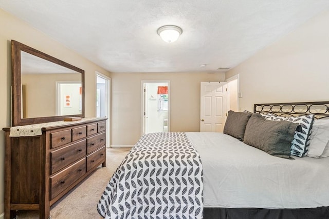 2 Strawstone Ln, Norton, MA 02766 - bedroom featuring light colored carpet, ensuite bathroom, and baseboards