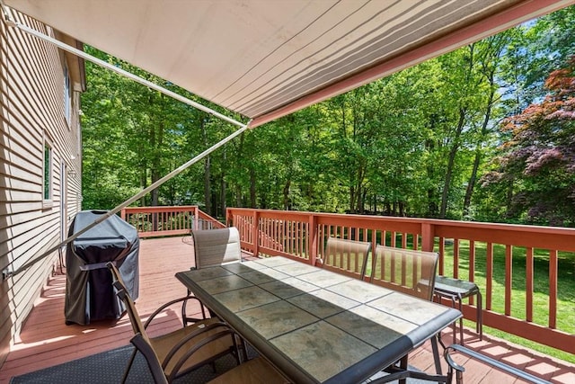 2 Strawstone Ln, Norton, MA 02766 - wooden terrace with outdoor dining area and area for grilling