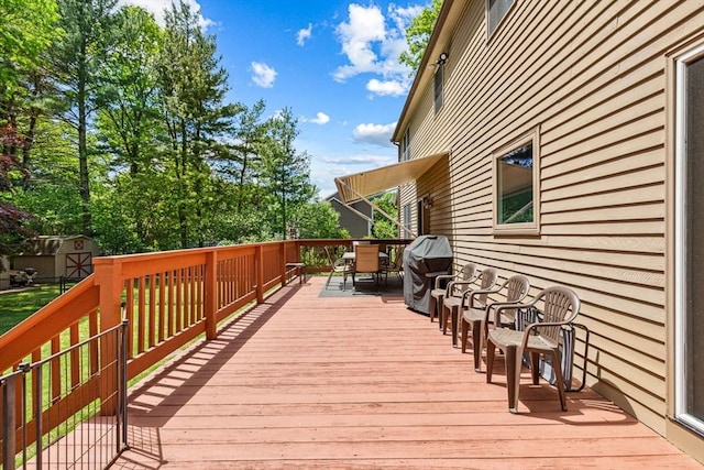 2 Strawstone Ln, Norton, MA 02766 - wooden terrace with outdoor dining space and area for grilling