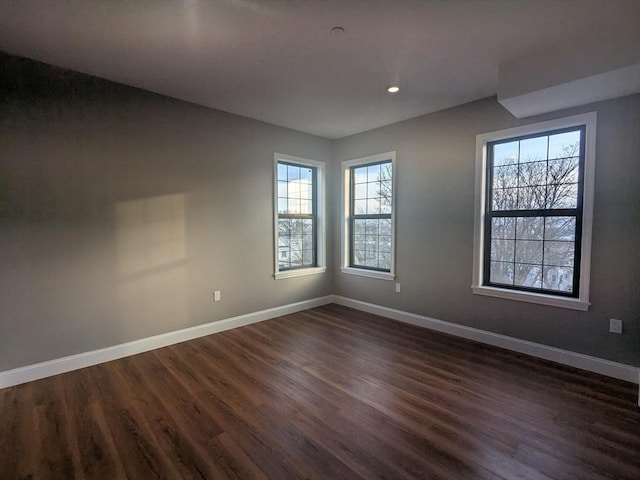 13 Nahant St Unit 3A, Lynn, MA 01902 - spare room with baseboards, dark wood finished floors, and recessed lighting