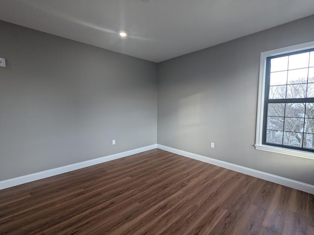 13 Nahant St Unit 3A, Lynn, MA 01902 - empty room with dark wood finished floors, baseboards, and recessed lighting