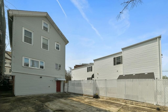 127 Beacon St, Chelsea, MA 02150 - back of property featuring fence and a patio area