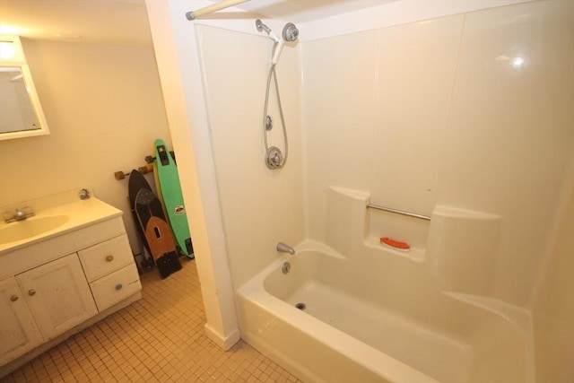 bathroom with bathing tub / shower combination and vanity