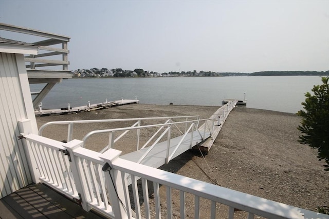 dock area with a water view