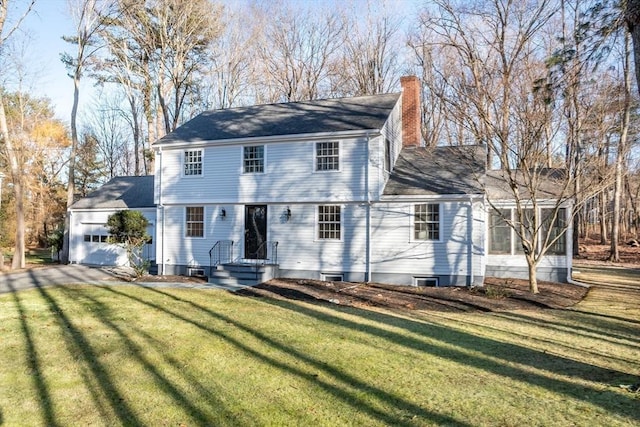 view of front facade featuring a front yard