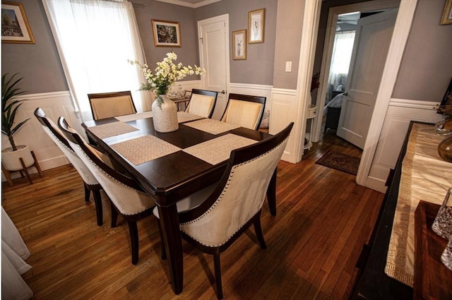 10 Albermarle St, Methuen, MA 01844 - dining area with wainscoting, dark wood-style floors, ornamental molding, and a decorative wall