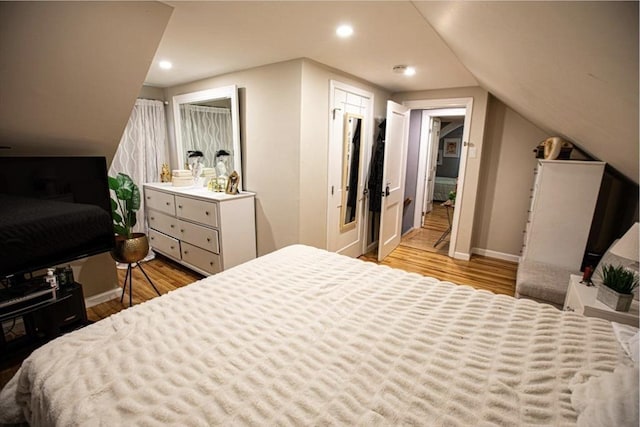 10 Albermarle St, Methuen, MA 01844 - bedroom with wood finished floors, recessed lighting, baseboards, and vaulted ceiling