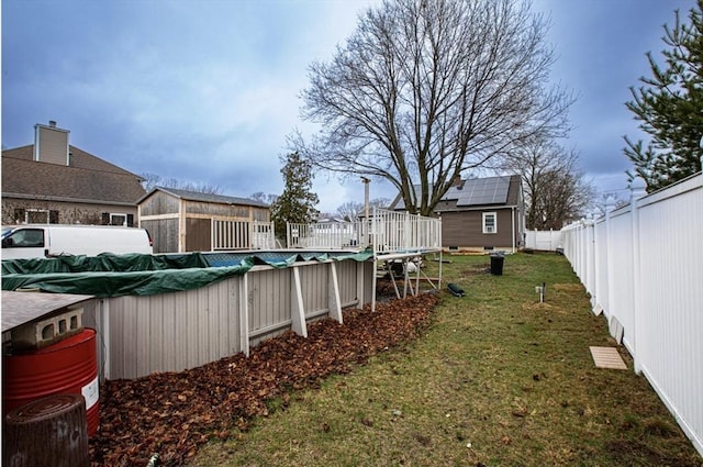 10 Albermarle St, Methuen, MA 01844 - view of yard featuring a deck and an outbuilding