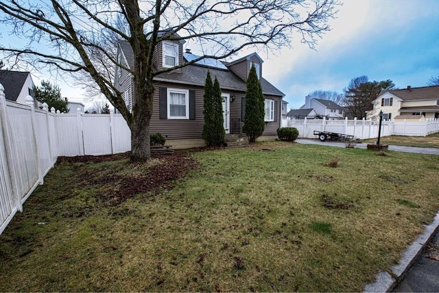 10 Albermarle St, Methuen, MA 01844 - view of front of home featuring a shingled roof and a patio area