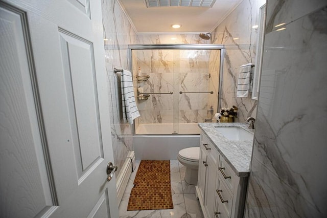 10 Albermarle St, Methuen, MA 01844 - bathroom with vanity, combined bath / shower with glass door, marble look tiles, toilet, and recessed lighting