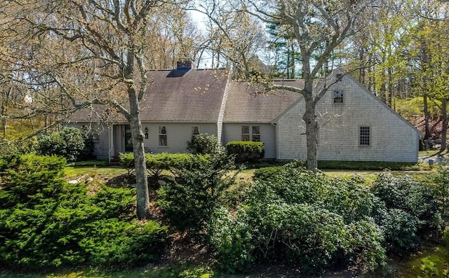 53 Wingfoot Dr, Barnstable, MA 02675 - view of side of home featuring a chimney