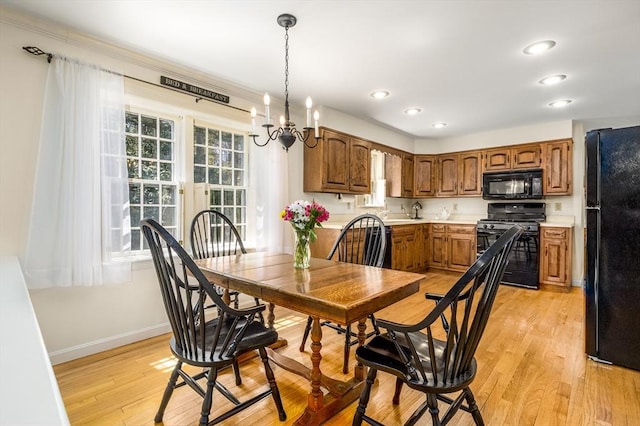 53 Wingfoot Dr, Barnstable, MA 02675 - dining space with baseboards, light wood-style floors, a chandelier, and recessed lighting