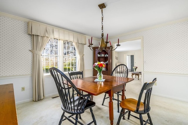 53 Wingfoot Dr, Barnstable, MA 02675 - dining area with wallpapered walls, crown molding, healthy amount of natural light, baseboards, and light colored carpet