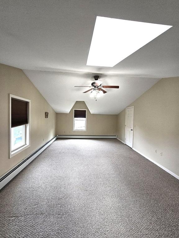 94 Barton St Unit 3, Pawtucket, RI 02860 - additional living space featuring vaulted ceiling, carpet, ceiling fan, and baseboards