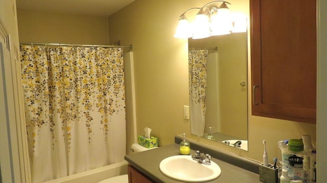94 Barton St Unit 3, Pawtucket, RI 02860 - bathroom with vanity, toilet, and shower / tub combo with curtain